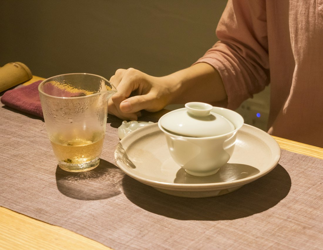 Serving warm herbal tea